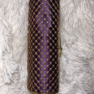 cesare paciotti dagger clutch